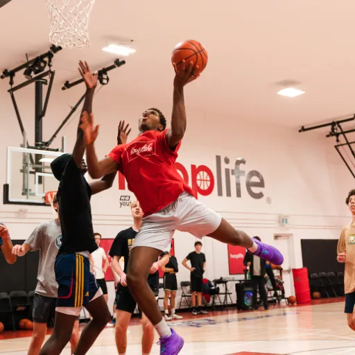 HoopLife High School Player contested for layup
