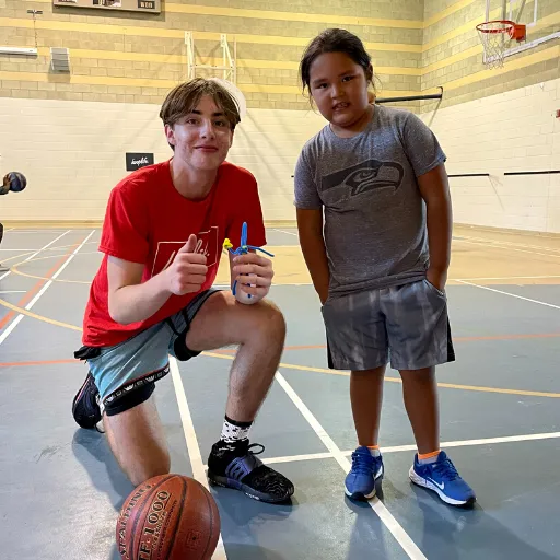 HoopLife Nations Camp Photo of Coach and Player